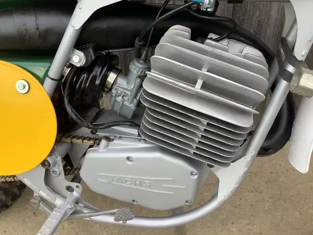 Close-up of vintage motorcycle engine component.