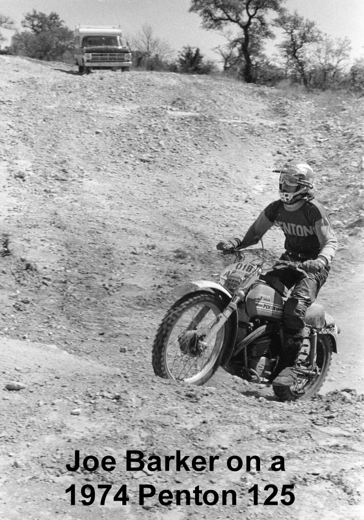 Motorcyclist rides vintage 1974 Penton 125 off-road.