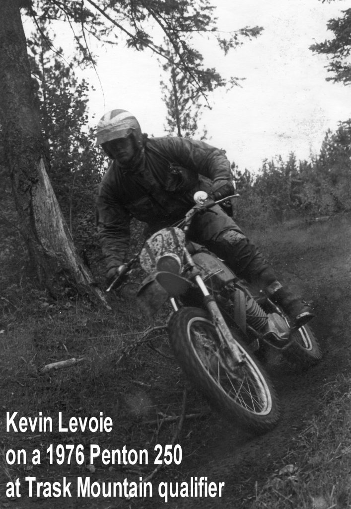 Rider on vintage motorcycle in forest race
