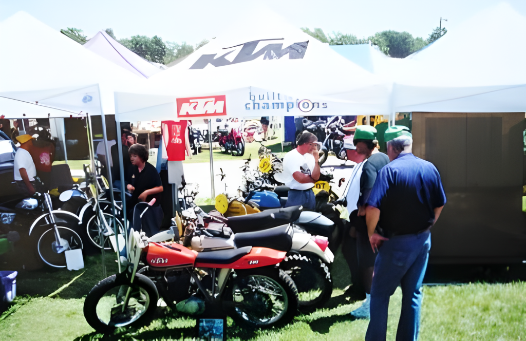 Motorcycle show attendees at KTM booth