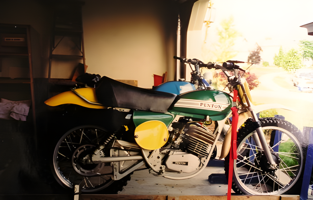 Vintage Penton motorcycle in a garage