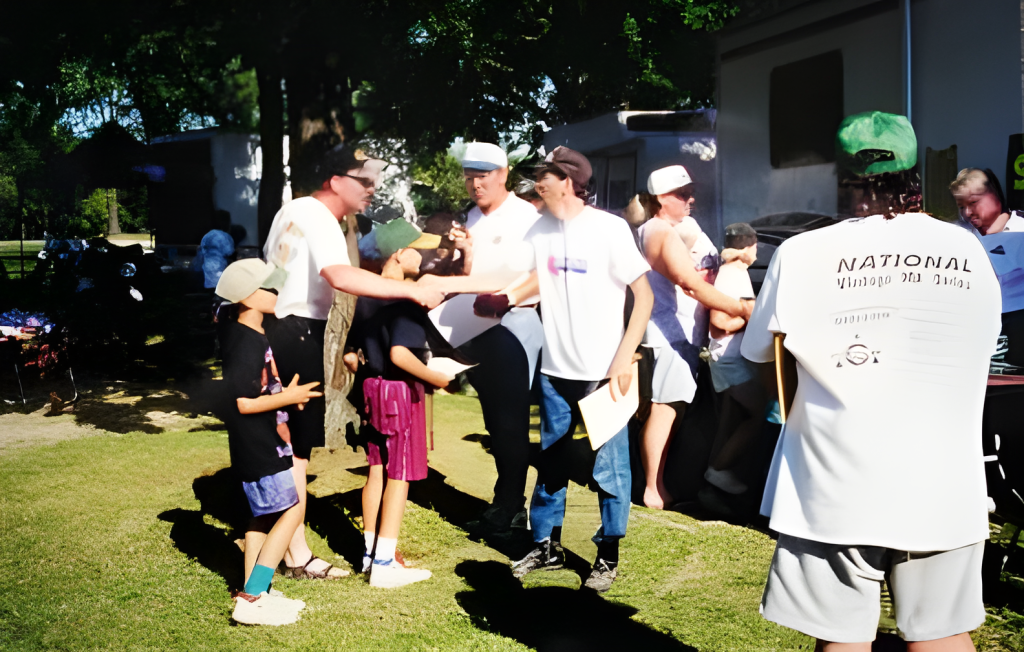 Group of people gathering at outdoor event
