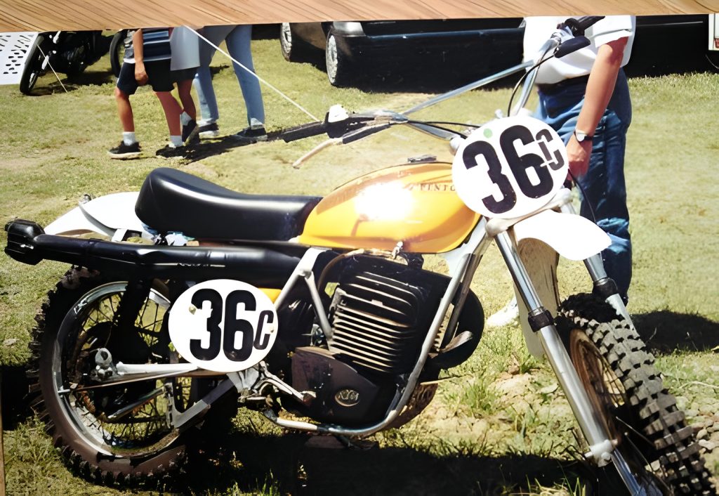 Vintage yellow motorcycle with number 36C