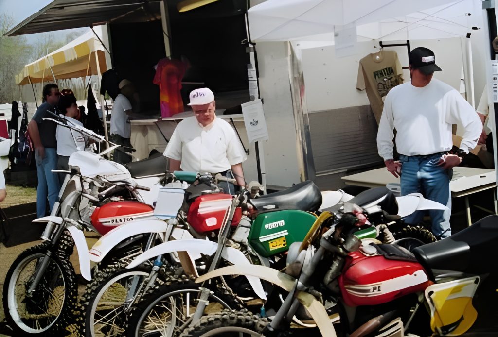 Vintage motorcycles on display at outdoor market