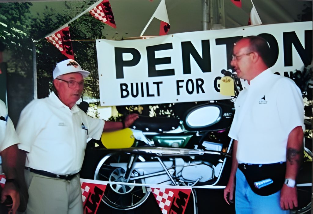 Two men at Penton motorcycle exhibit