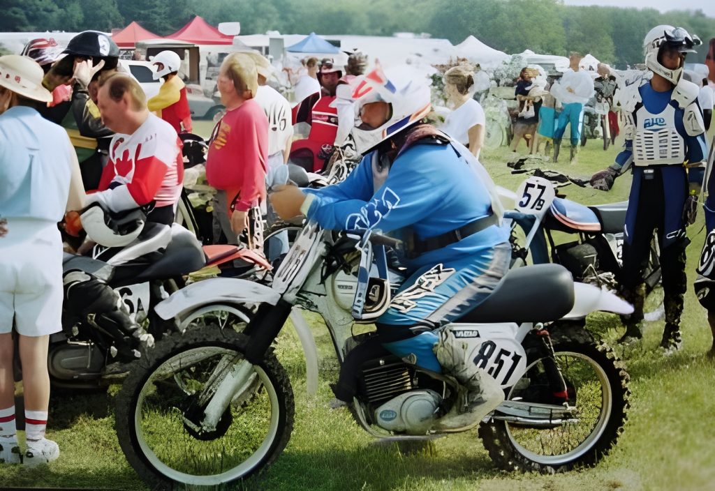 Group of motocross riders preparing to race