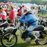 Group of motocross riders preparing to race