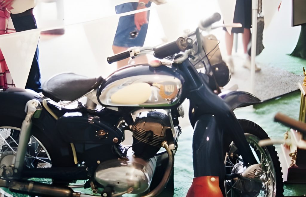 Vintage motorcycle on display with vibrant colors.