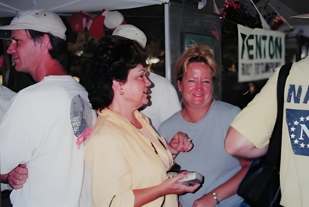 People socializing at a casual indoor event.
