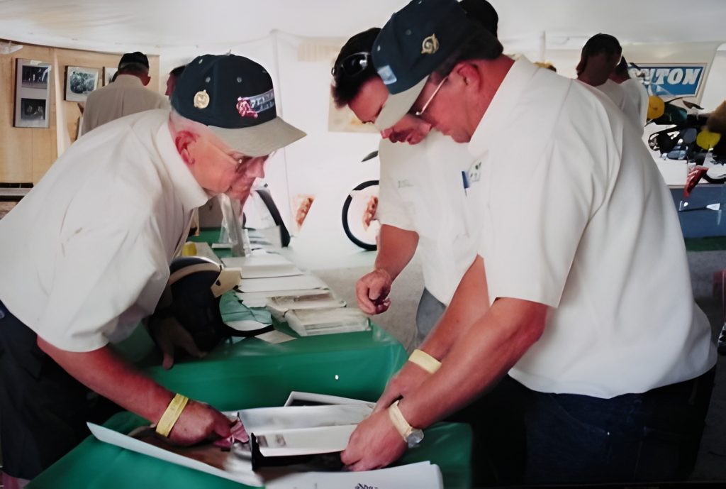 Group reviewing documents at a table.