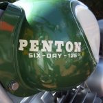 Close-up of green Penton 125cc motorcycle gas tank.