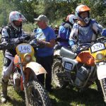 Motorcyclists discussing before a race start