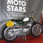 Vintage motorcycle on display at Moto Stars exhibit.